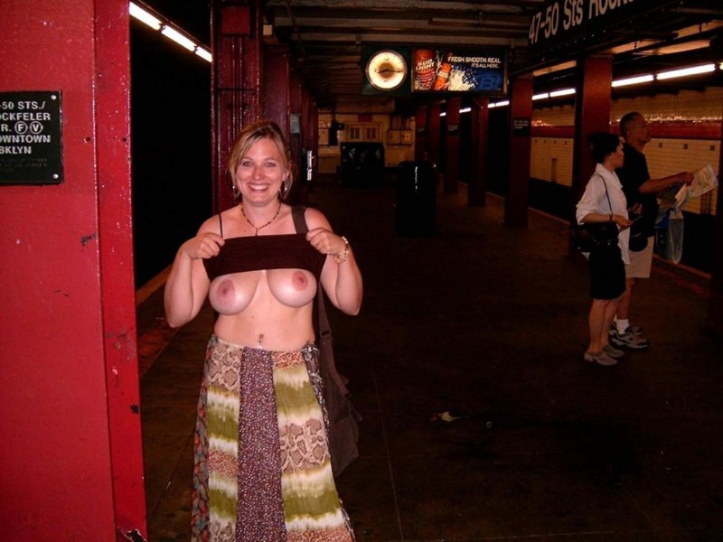 Bared her breasts in public